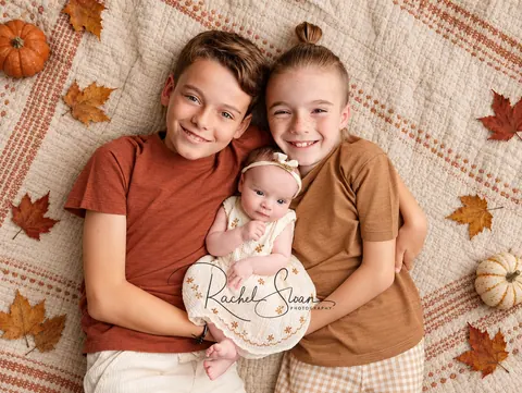 Warm autumn siblings with newborn-6