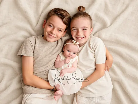 Timeless ivory siblings with newborn-1